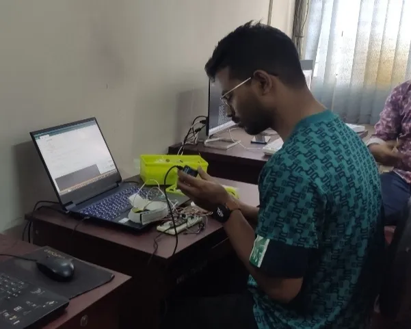 Graduate Student Pavel working on his project